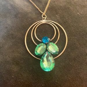 Beautiful silver tone and bluish/green stone Pendant. On 18 in chain